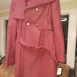 GUESS FEMALE COAT. THE COLOR IS ACTUALLY BURGANDY